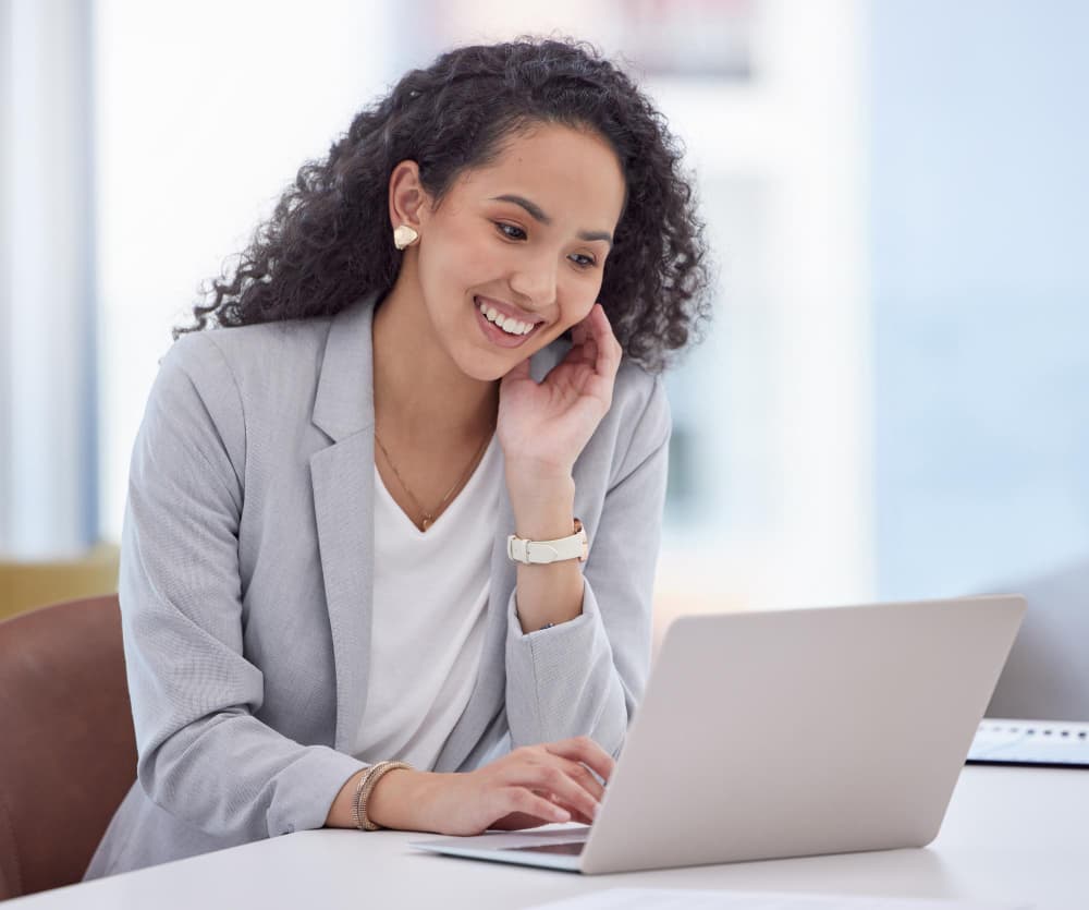 Cyber security business professional looking at the laptop